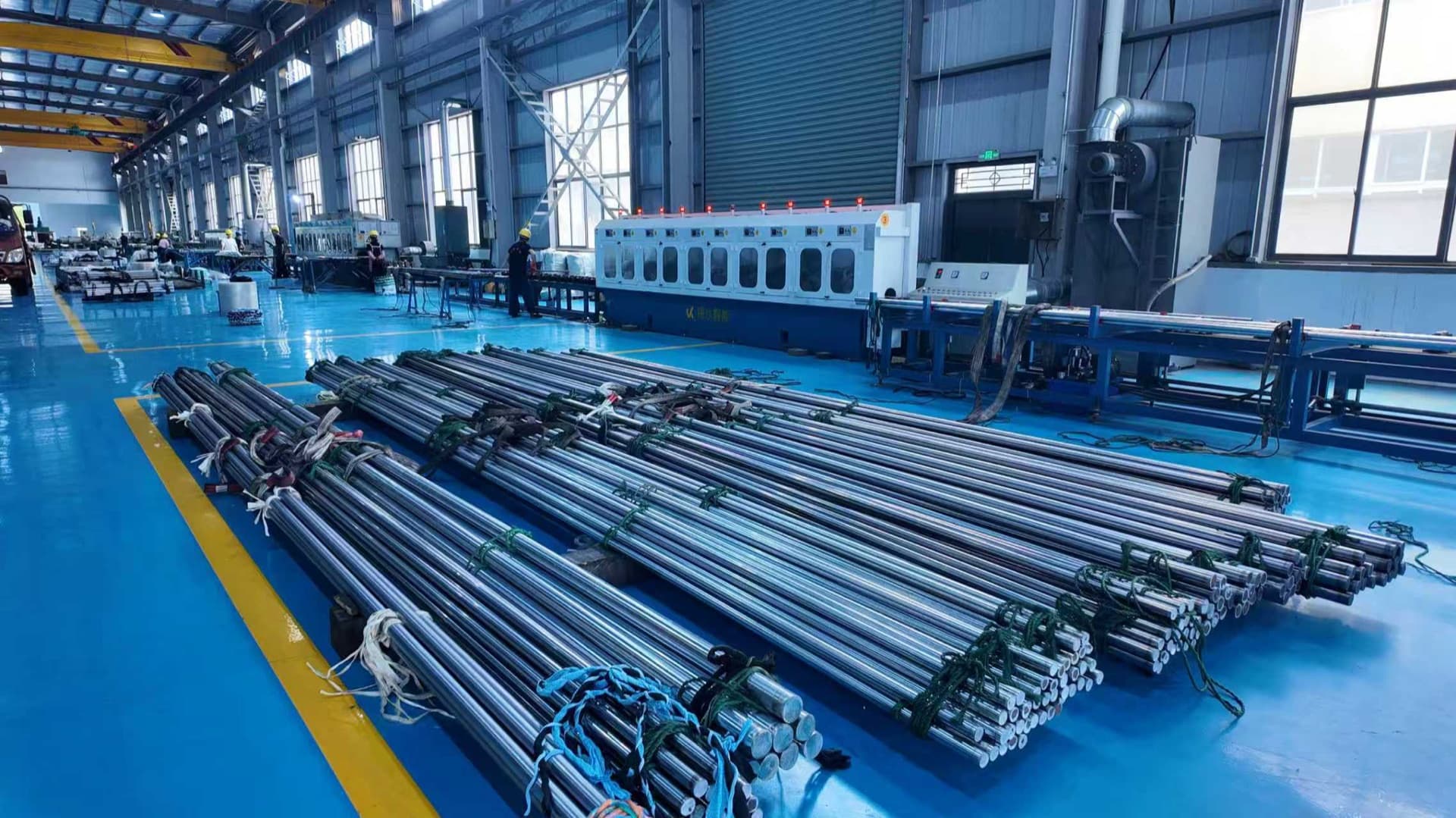 Bundles of hard chrome plated rods stored inside XIJIU hydraulic component factory